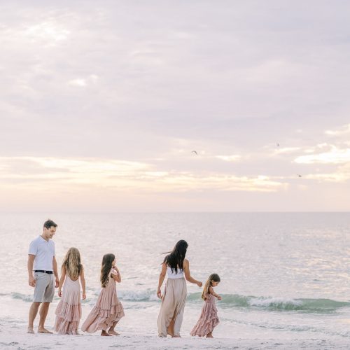 girls playing on the beach