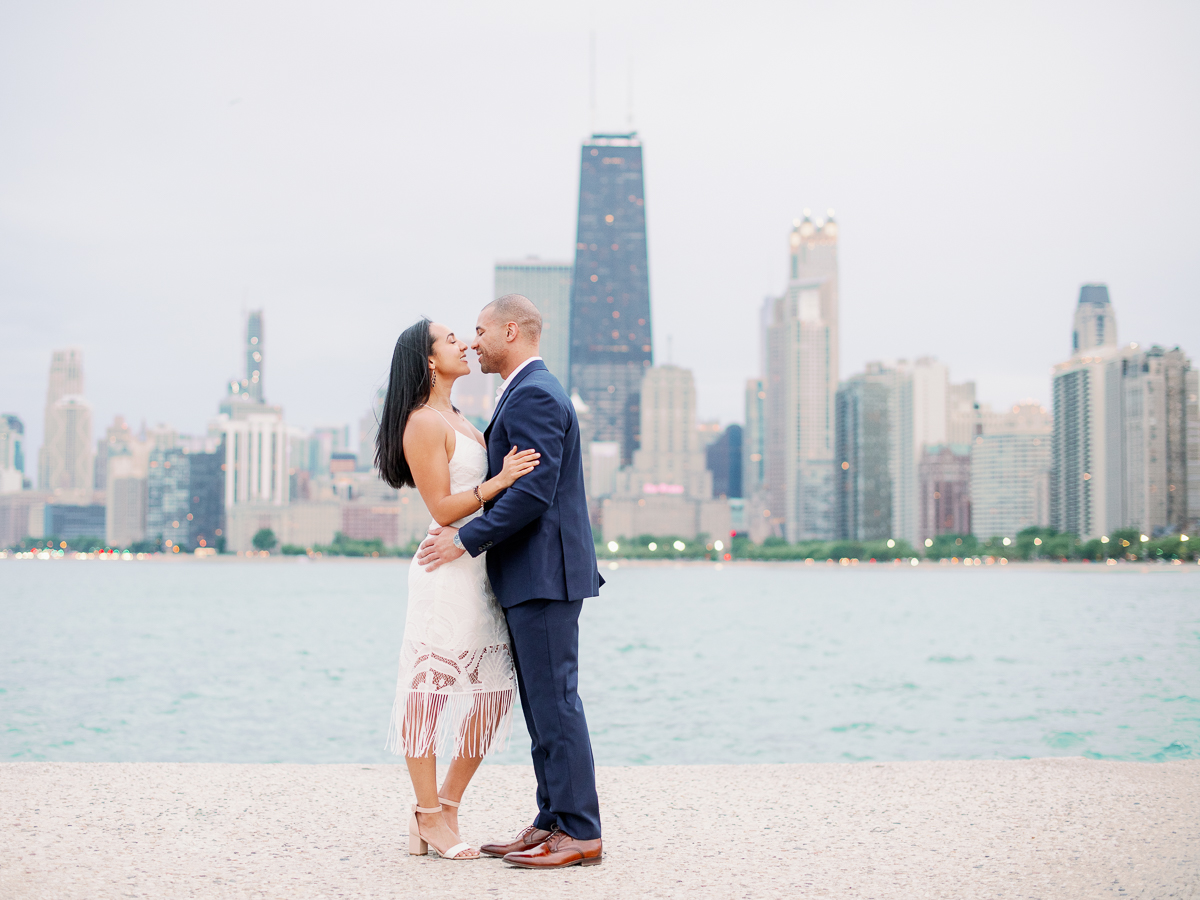 Where to take photos in Chicago with skyline – North Avenue Beach Lincoln Park Engagement Photos-1