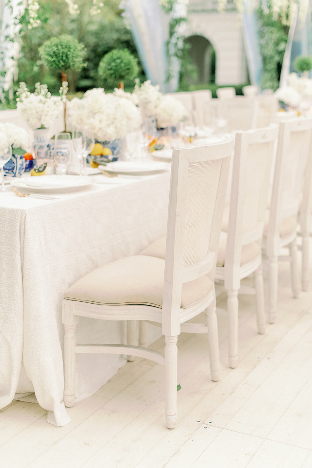 White chairs wedding reception