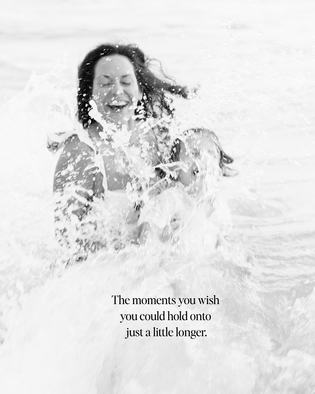 mom splashing in ocean in naples