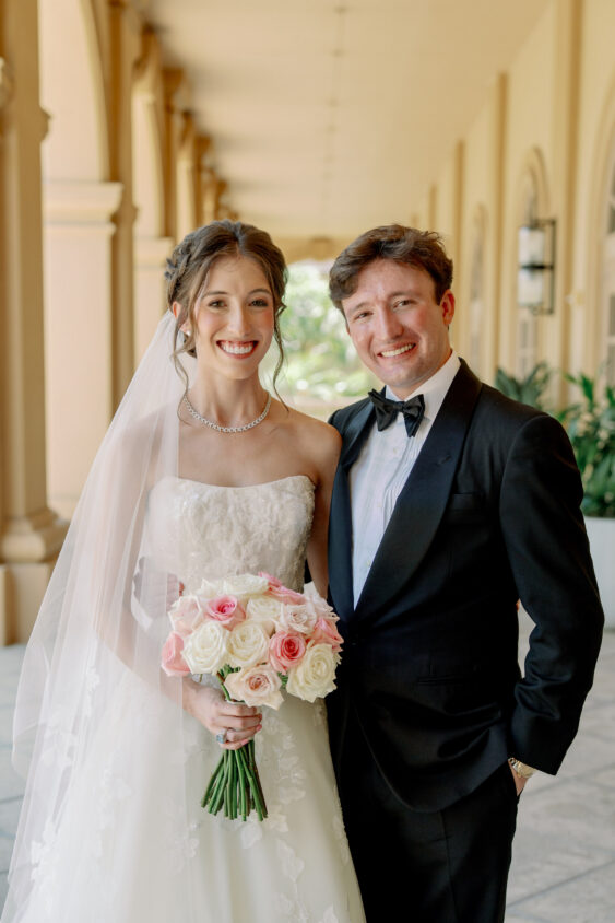 Bride and groom portrait among the architecture at Ritz-Carlton Naples