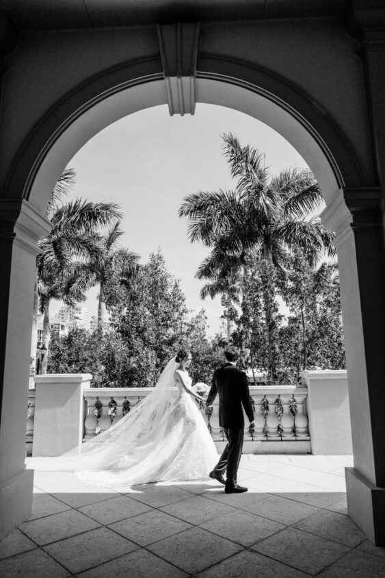 Bride and groom portrait among the architecture at Ritz-Carlton Naples