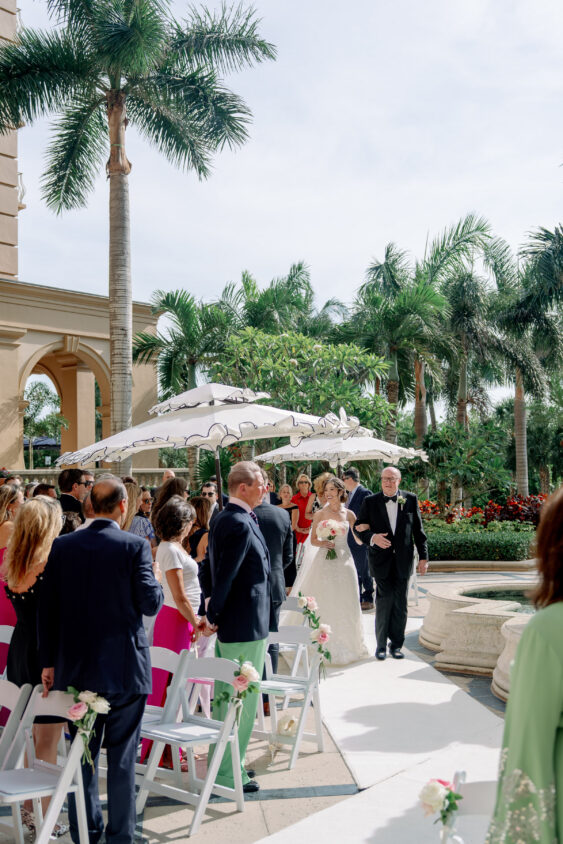 Bride walking down the aisle at Ritz-Carlton Naples wedding