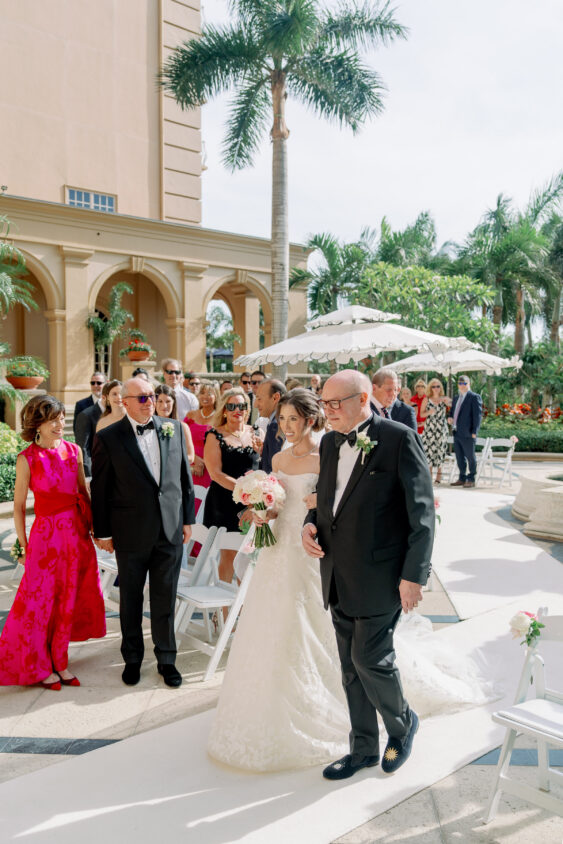 Bride walking down the aisle at Ritz-Carlton Naples wedding
